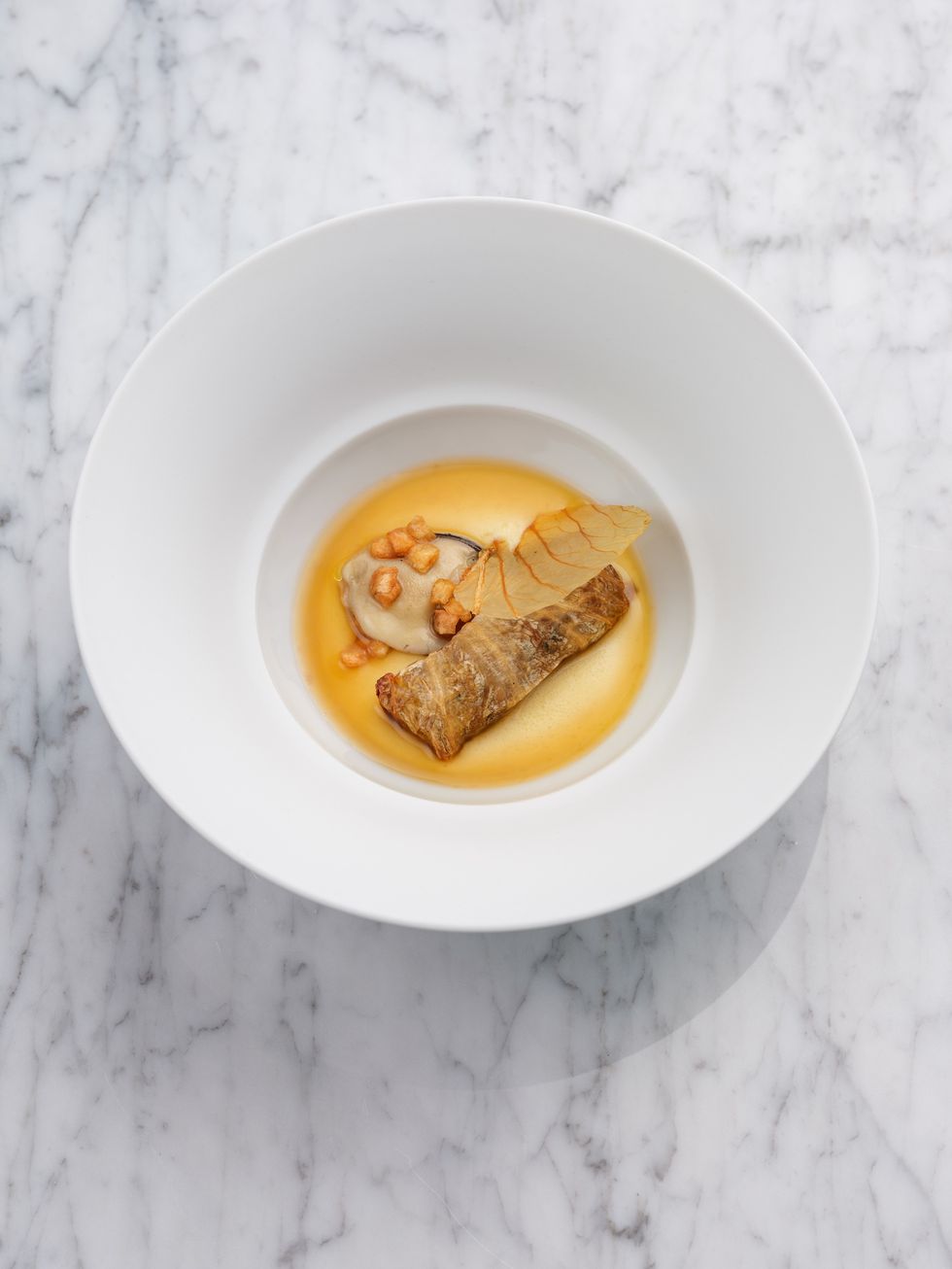 Glasswing_Restaurant_Oyster_press.jpg